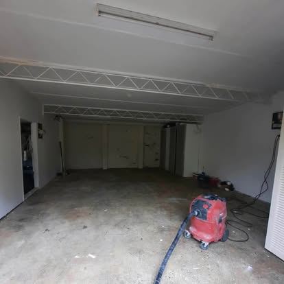Garage floor part-way through mechanical preparation